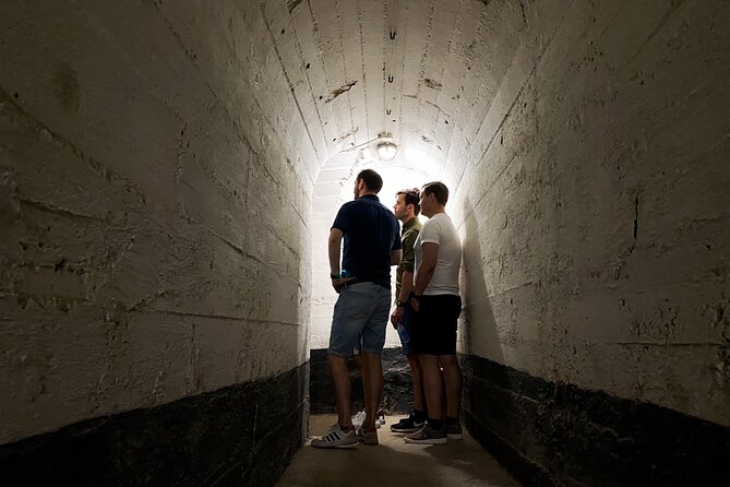 Belgrade Underground Tour w/ Sparkling Wine Along the River - Stop 3: Austrian Gunpowder Warehouse, Touching Cave Walls, And Artifact Displays